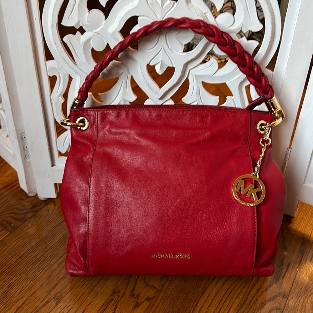 Red leather Michael Kors bag in immaculate condition.